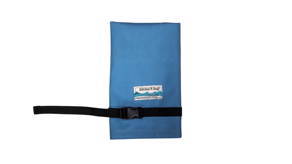 A blue utensil stow displaying the closed configuration and buckle closure against a white background