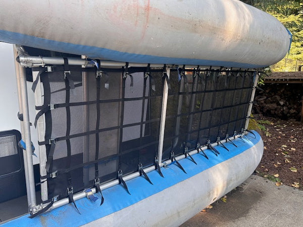 Bottom of a custom mesh cataraft floor showing attachment points to the raft frame on a blue cataraft. 