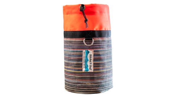 An orange mesh and cordura bowline bag with rope cinch closure and d-ring. 