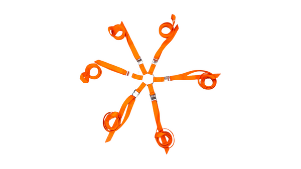 An orange cargo harness with multiple buckles and straps arranged in a circular pattern against a white background.