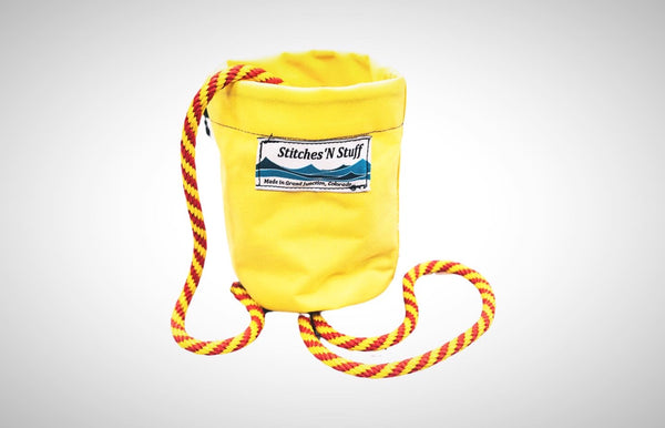 A yellow cordura flip line bag with floating polypro rope. 